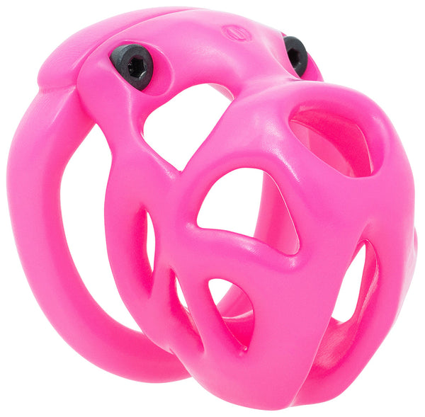 A vibrant pink Hera nylon MJF 3D printed chastity cage kit in XS size with two black hex screws at the top of the cage. It has a smooth surface and a number of ventilation holes incorporated into the ergonomic design.