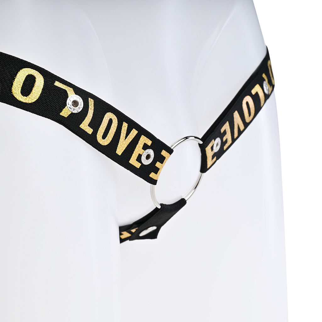 Close up of the black strap with gold love text attached to a metal o-ring.