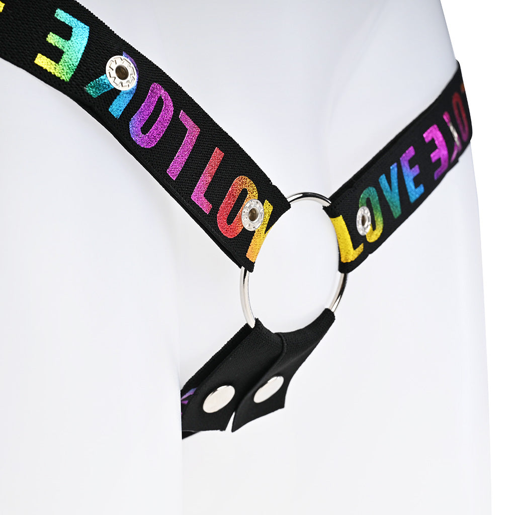 Close up of the 4 way strap with Love wording in rainbow text and how it attaches to a metal back ring.