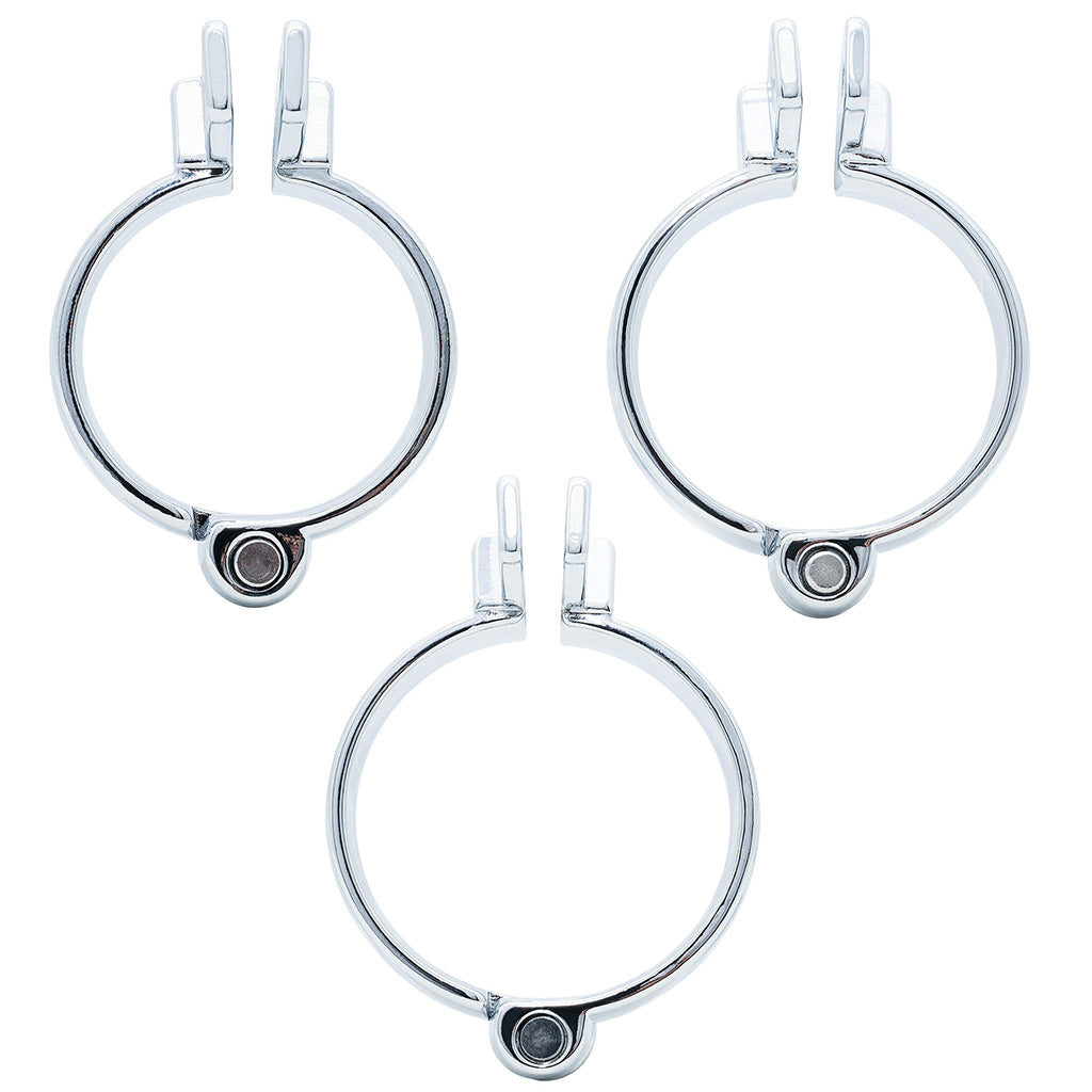 Three polished metal circular hinged back rings in different sizes, arranged on a plain white background.