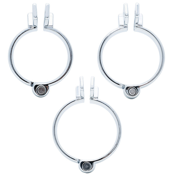 Three polished metal circular hinged back rings in different sizes, arranged on a plain white background.
