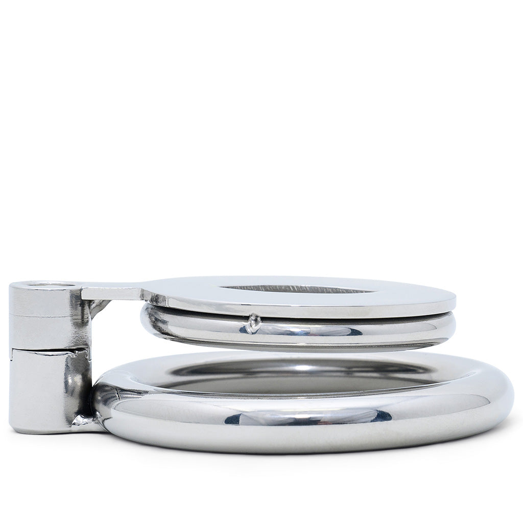 A flat metal cage lying flat attached to a circular ring, shown on a solid white background.