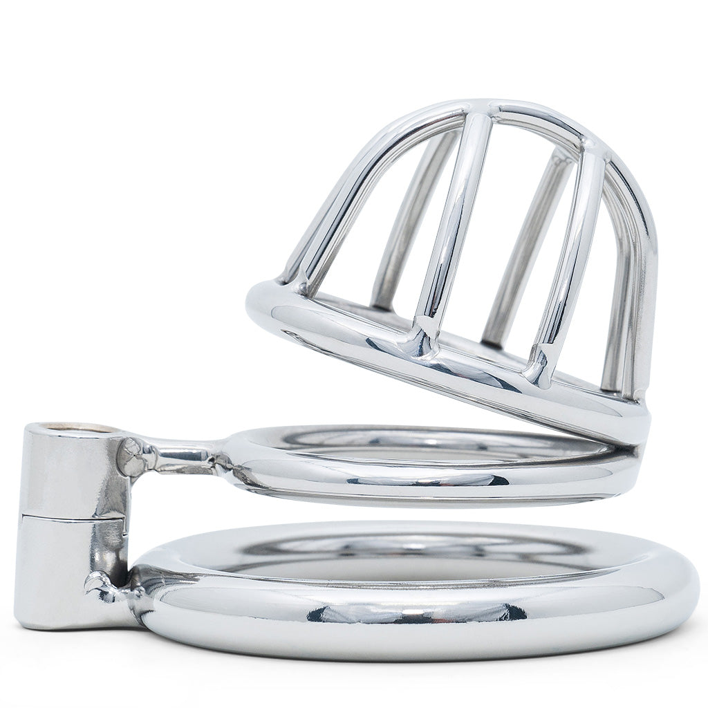 A polished metal adult novelty item with a curved cage-like top and circular back ring, photographed on a clean white background.