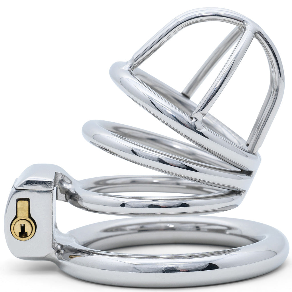A polished metal adult novelty item with a curved large cage size top and circular back ring, photographed on a clean white background.