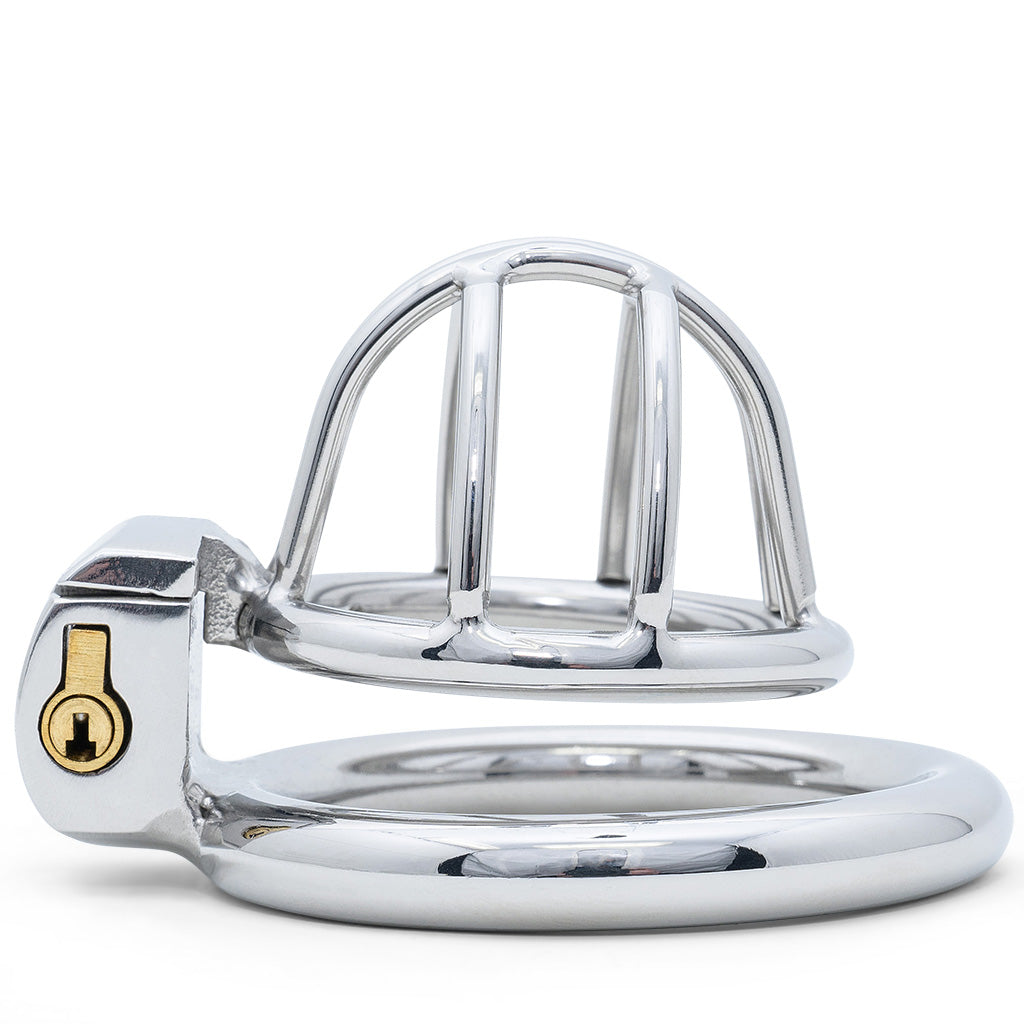 A polished metal chastity device with a lock and keyhole on the side, shown on a clean white background.