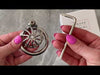 Attaching the spiral metal S111 cage to the back ring, putting the screw lock into the kit then locking it shut using a hex allen key.