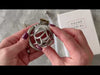 Attaching a large size S204 tube to a circular back ring then locking the parts together and removing the key.