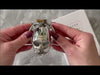 Attaching the large size S211 cage to a stainless steel curved back ring, inserting a brass lock then removing the key.