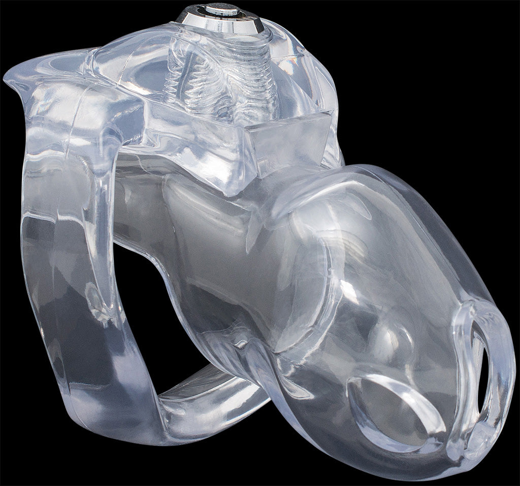 Small size clear House Trainer V5 chastity device made from resin with a silver circular pop up lock on the top of the ring against a black background.